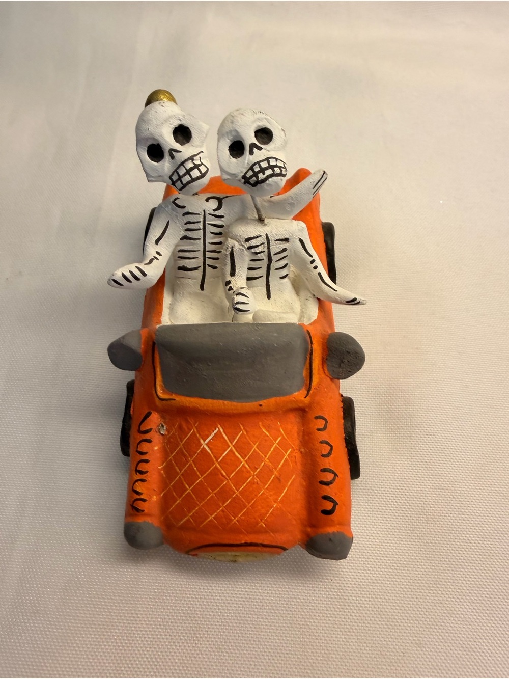 Day of the Dead Couple in Orange Ceramic Car